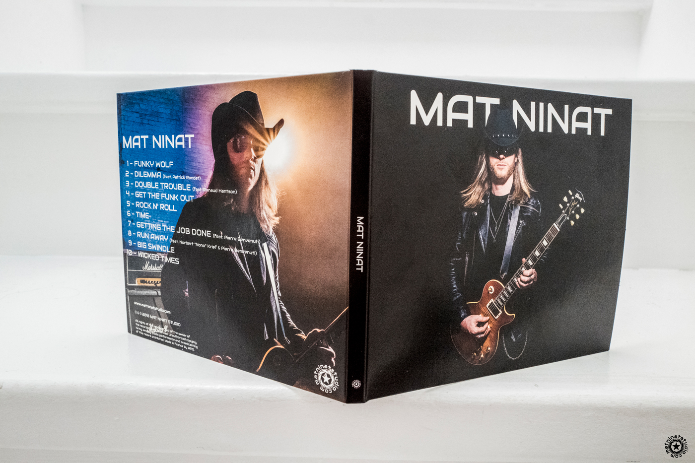 Mat Ninat 2018 CD Digipack showcasing the album cover and tracklist on the back.